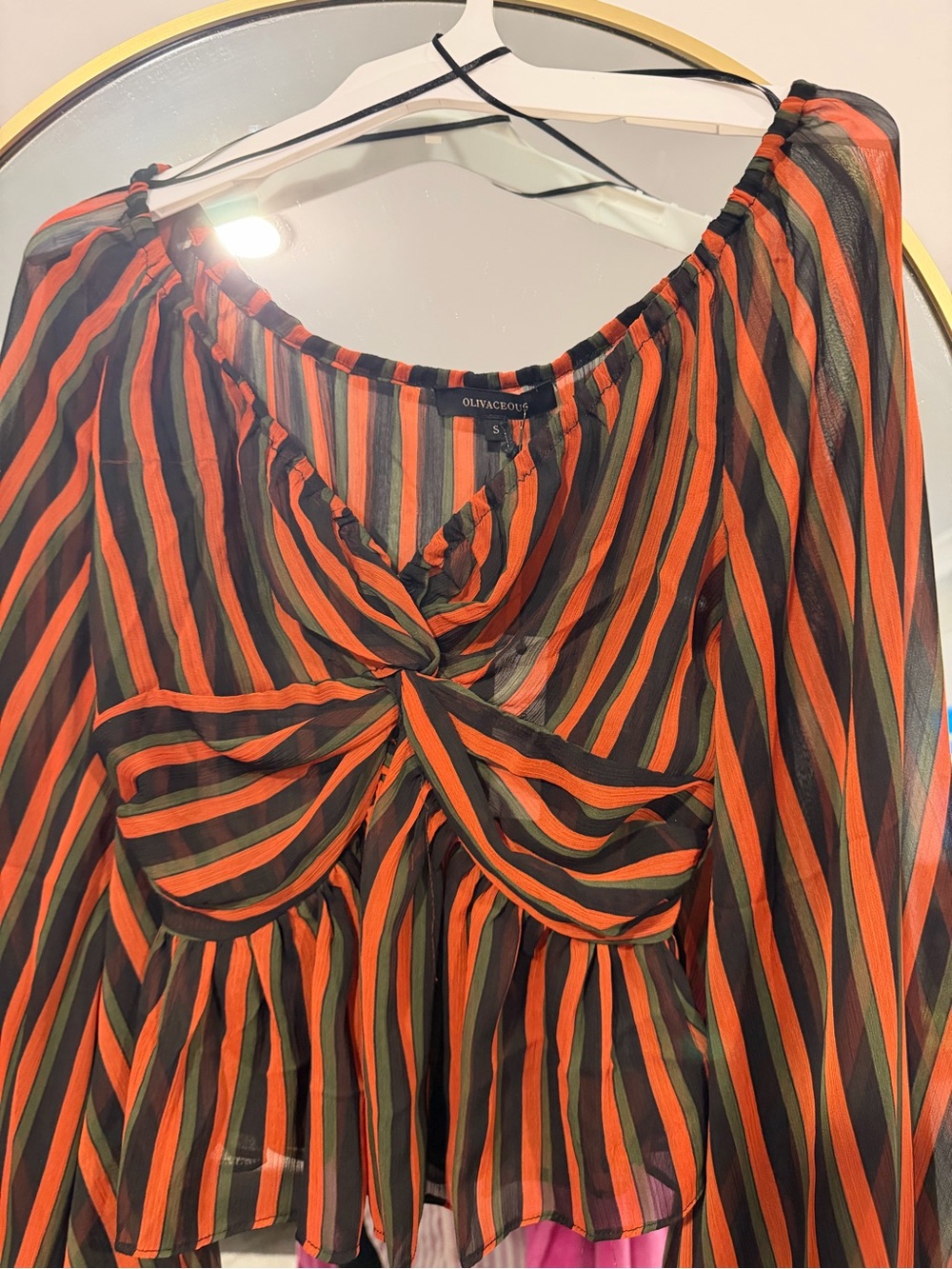 Olivaceous Orange and Black Twist-Knot Peplum Blouse